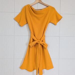 Citrus orange asymmetrical neck knit tie front mini dress